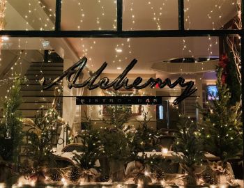 Alchemy Logo Alchemy Logo on the outside window looking in